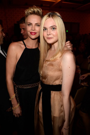 19 апреля 2013 года с Шарлиз Терон на Annual GLAAD Media Awards.