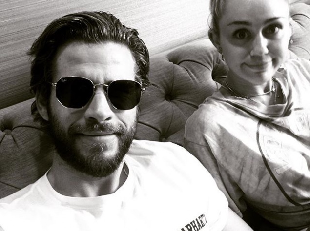 "Мой маленький ангел и я", - написал Лиам под новым фото.