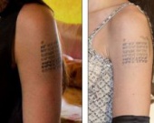 Новая татуировка Джоли не относится к расширению их семьи