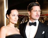 Брэду Питт и Анжелине Джоли пришлось лезть через забор