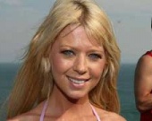 Таре Рейд следует прятать живот от чужих глаз