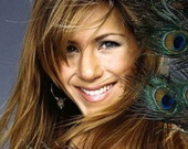 Дженифер Анистон удалось покататься на серфинге (ФОТОРЕПОРТАЖ)